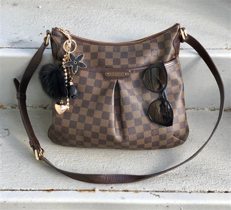 louis vuitton bloomsbury pm vs gm|louis vuitton discontinued bags.